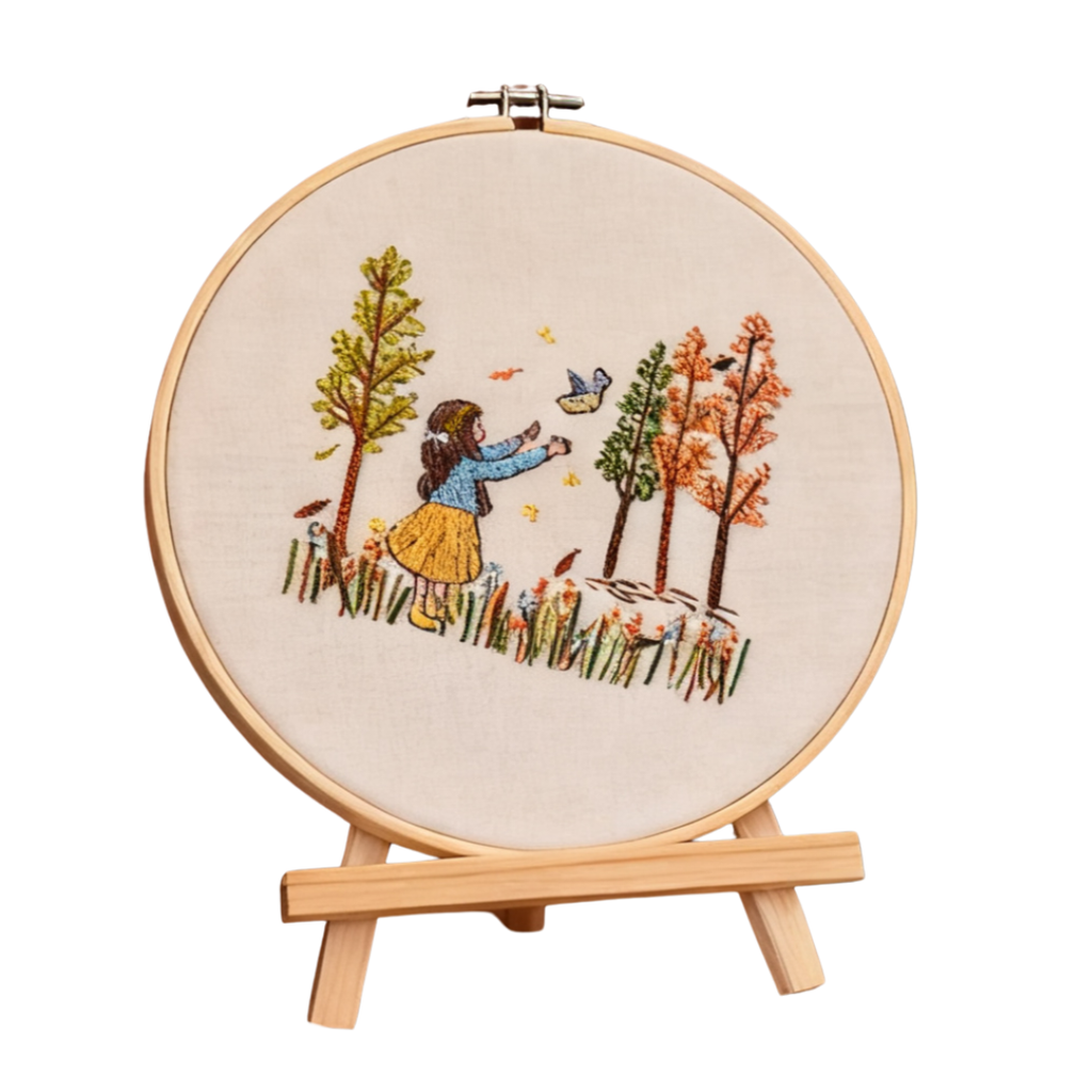 Balade d'automne – Kit de broderie avec une fille, un oiseau et des arbres d'automne