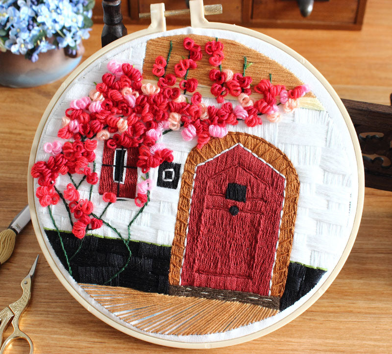 Scarlet Door – Borduurset met rode deur en bloesemboom
